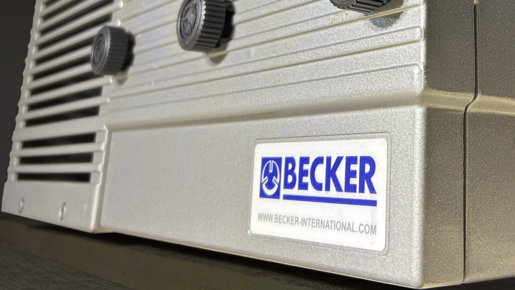 becker-x becker international logo on a pump