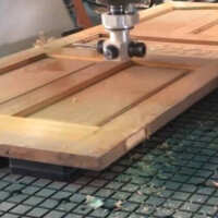woodworking woodworking cnc vacuum bed routing shapes into a wooden door