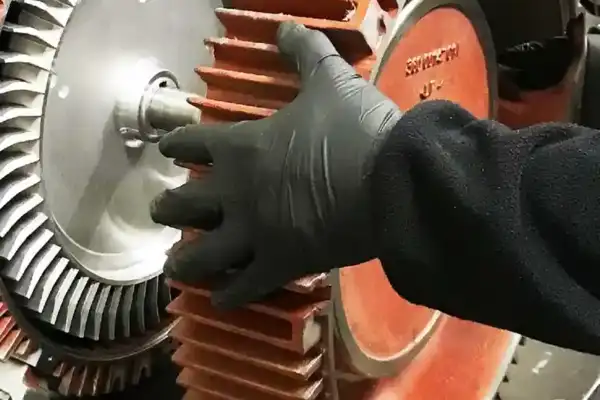 service Engineer dismantling a side channel blower pump